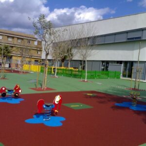 pavimento de caucho continuo escuela pública